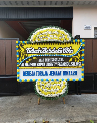 Papan Bunga Duka di Lais